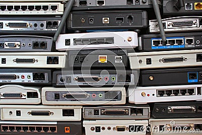 Old modems, routers, network equipment. Serial ethernet connectors Stock Photo