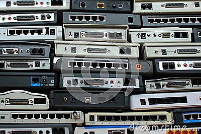 Old modems, routers, network equipment. Serial, phone, audio, et Stock Photo