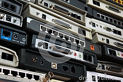 Old modems, routers, network equipment. Serial, phone, audio, et Stock Photo