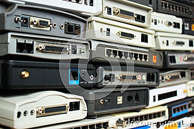 Old modems, routers, network equipment. Serial, phone, audio, et Stock Photo