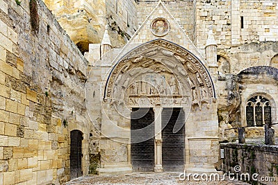 Old monolithic church entrance Stock Photo