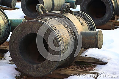 Old mortar on snow Stock Photo