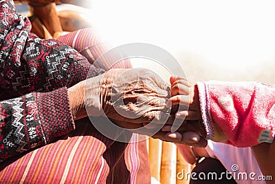 old mother held close hands Stock Photo