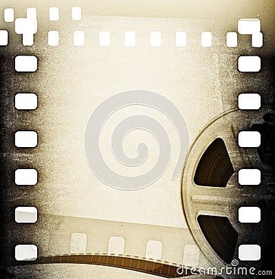 Old motion picture film reel with film strip. Vintage background Stock Photo