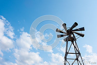 Old multidirectional emergency siren attached to a steel pylon Stock Photo