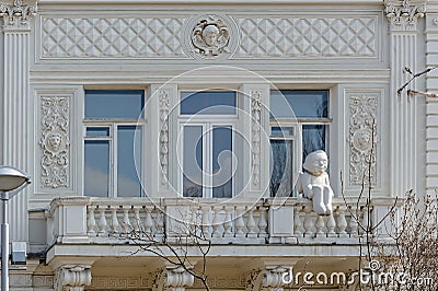 Old museum building with angel on the balcony in Kyiv Ukraine Stock Photo