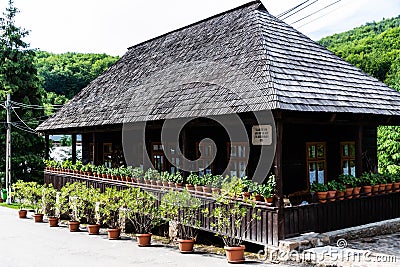 Old museum house in the courtyard of the Izbuc monastery Editorial Stock Photo