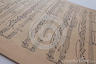 Old music sheet - music notes on yellow paper Stock Photo