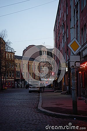 old narrow street lined with paving stones. the city of Kaliningrad November 15, 2021 Editorial Stock Photo