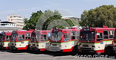 Old non-air conditioned Isuzu buses at a bus depot Editorial Stock Photo
