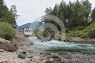 Old non-functioning Chemal hydroelectric power station. Journey to the Republic of Altai, Siberia, Russia. Travel HPP Stock Photo