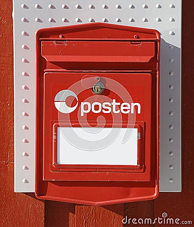 Old norwegian red mailbox Stock Photo