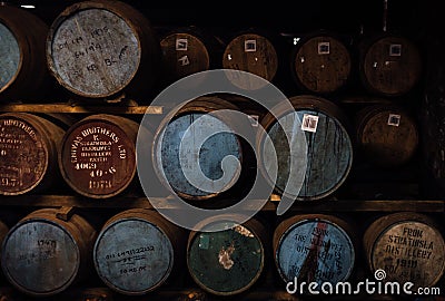 Old Oak Barrels full of good whiskey from various distilleries Editorial Stock Photo