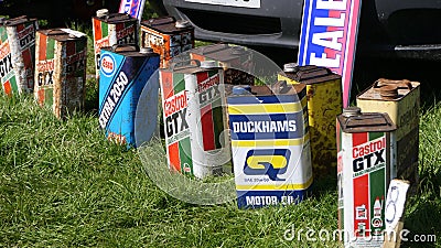 Old Oil jars cans at Farming Trade stalls at Shanes Castle Day Steam Rally 1 May 2022 Editorial Stock Photo