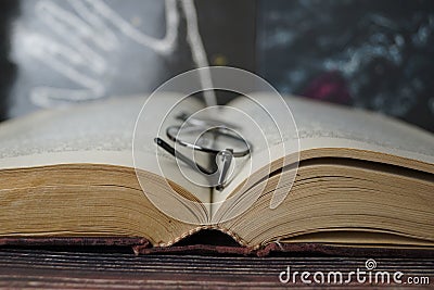 Book on a wooden table Stock Photo