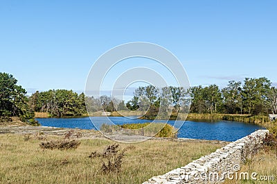 Old open quarry turned into a beautiful lake Stock Photo