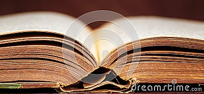 Old opened antique book, reading, library banner Stock Photo