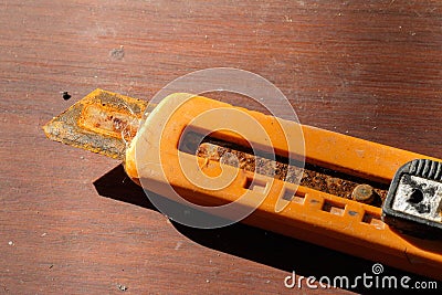 Old orange cutter. Stock Photo