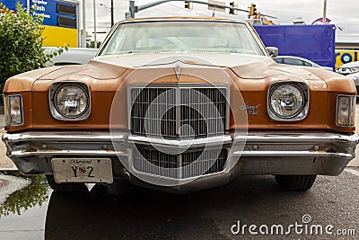 old orange rusty Pontiac Grand Prix third generation Editorial Stock Photo