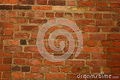 Old, orange real stone brick wall texture, brick wall background Stock Photo