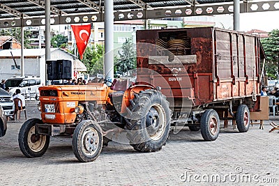 Old orange Tractor of brand Turk Fiat Editorial Stock Photo