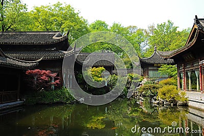 Old oriental structures with garden and fish pond Stock Photo