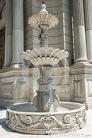 Old ornate fountain in palace grounds Stock Photo