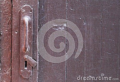 Old painted door handle with keyholder Stock Photo