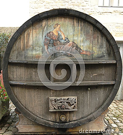 An old painted wine barrel in Chateau de Pommard in France Editorial Stock Photo