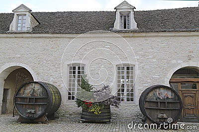 An old painted wine barrels in Chateau de Pommard, Burgundy, France Editorial Stock Photo
