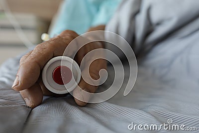 old patient hand with safety needle on back palm Stock Photo