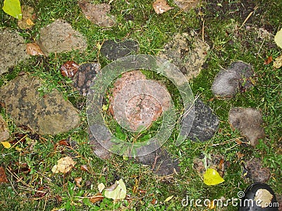 Background. fragment. texture. the old road is paved with wild stone, cobblestones. landscape design, natural style. Stock Photo