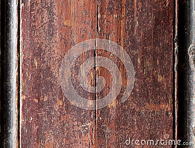 Old peeling brown paint on a wooden surface Stock Photo