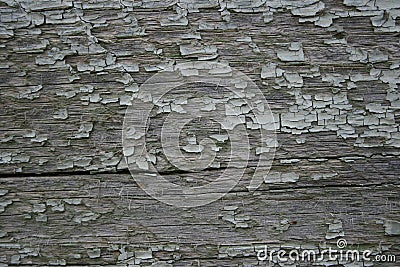 Old peeling paint on a wooden surface. Stock Photo