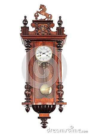 Old pendulum clock on wall Stock Photo