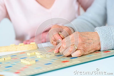 Old people playing game Stock Photo