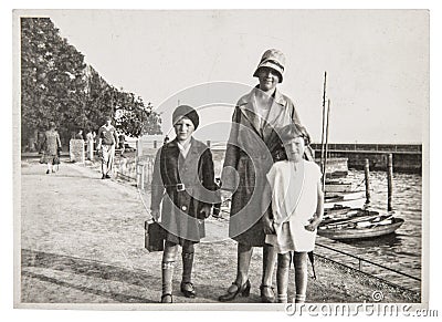 Old photo mother children on the sea Vintage picture Stock Photo
