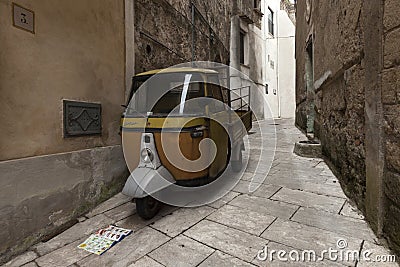 old Piaggio Ape motorcycle in Sant`Agata DE Goti, in italy Editorial Stock Photo