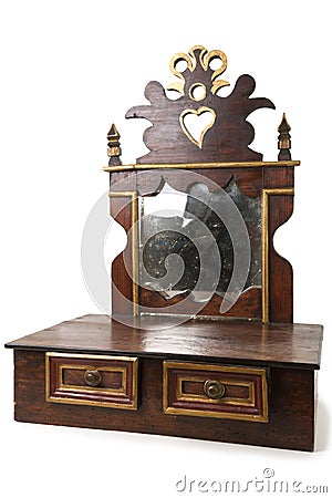 Old Piece of Furniture with Drawers and Mirror Stock Photo