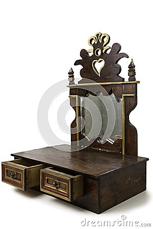 Old Piece of Furniture with Drawers and Mirror Stock Photo