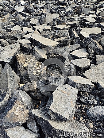 old asphalt, pieces of asphalt, road repairs Stock Photo