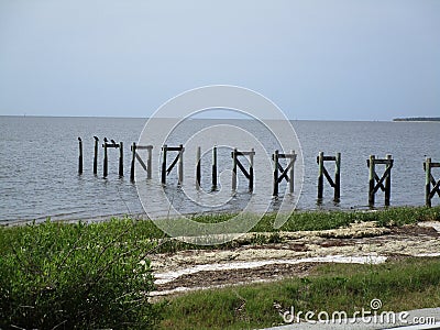 Old pier pylons Stock Photo