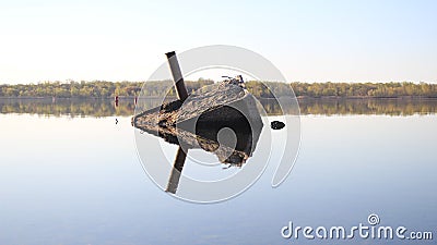 The old pier is submerged Stock Photo