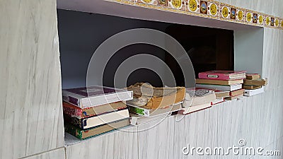 Old pile of quran in a mosque Editorial Stock Photo