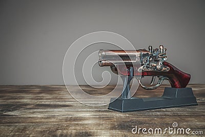 Model of old pistol used in history Stock Photo