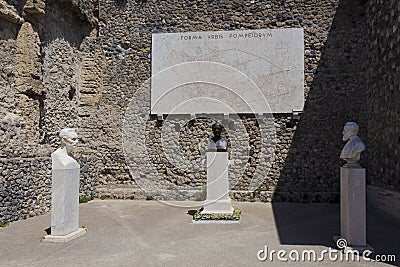 The old plan of Pompeii city and commemorative statues Editorial Stock Photo