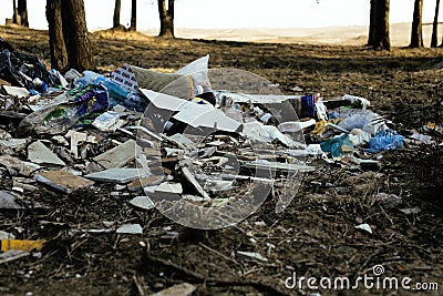 Old plastic garbage in forest, big mountain with nobody care of nature, modern environment trash concept Stock Photo