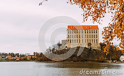 The old Plumlov castle builded in Baroque architecture style in Plumlov town on the pond bank, Moravia, Czech Republic Stock Photo