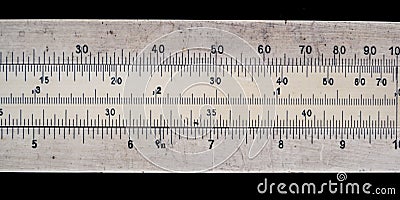 Old pocket slide rule mechanical calculator Stock Photo