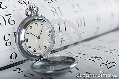 Old pocket watch and calendar Stock Photo